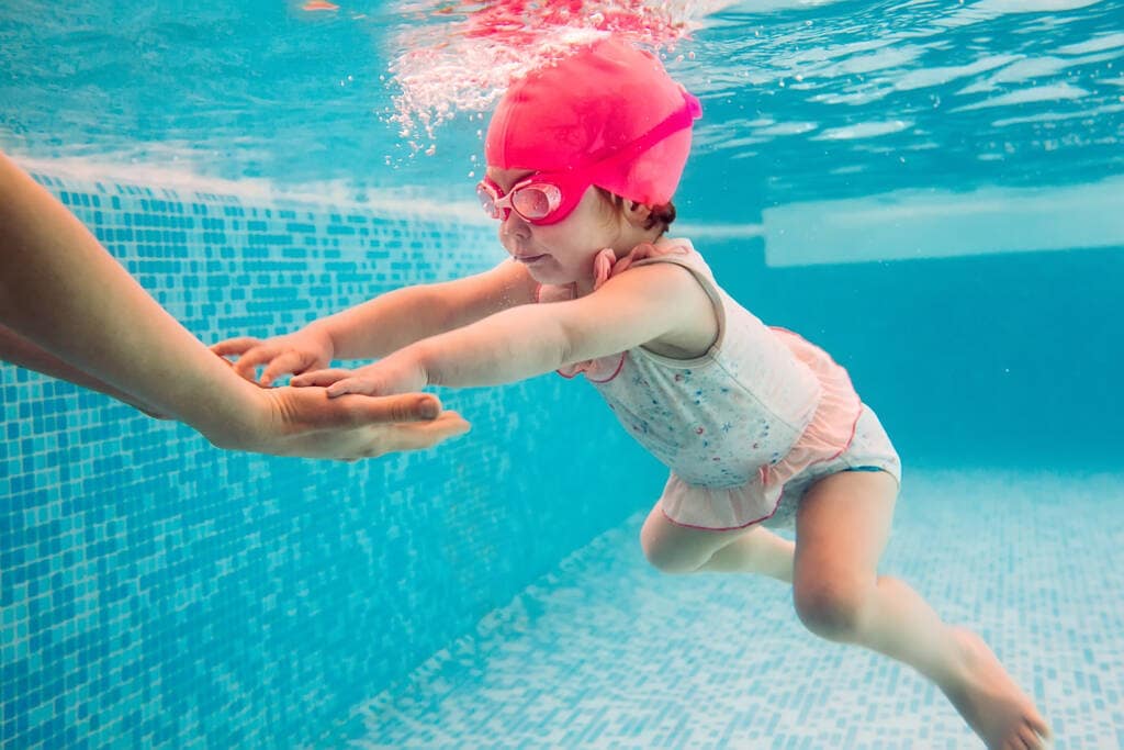 Teaching Little Ones To Swim AdobeStock 418962601 1024x683 1